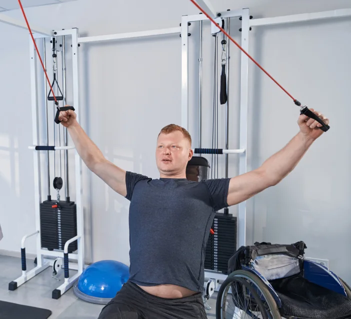 Patient doing resistance band rehab exercises